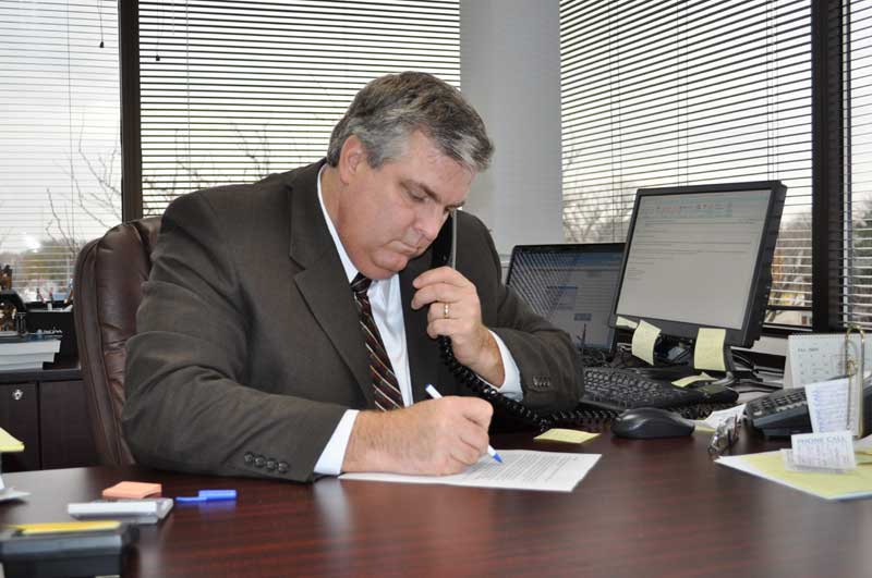 Candidate Jim Hursh working at his desk